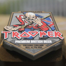 Load image into Gallery viewer, TROOPER PUMP CLIP (made of heavy metal) on table
