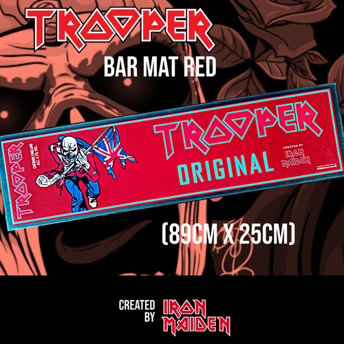 Iron Maiden Trooper bar mat in red featuring Eddie the Trooper mascot holding the Union Jack flag, with Trooper Premium British Beer branding. The bar mat measures 89cm by 25cm and is created by Iron Maiden and handcrafted by Robinsons Brewery.